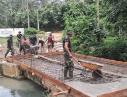Kodim 0207/Simalungun Pembangunan Jembatan Gantung di Nagori Kahean Progres 67 Persen